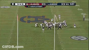 A Football Game Between Auburn And Alabama Is Being Played GIF