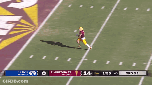 A Football Game Between Byu And Arizona St. GIF