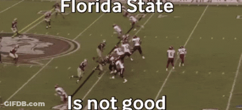 A Football Game Between Florida State And Alabama GIF