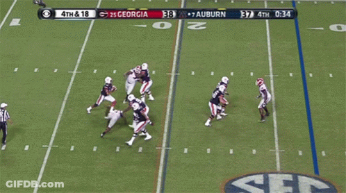 A Football Game Between Georgia And Auburn GIF
