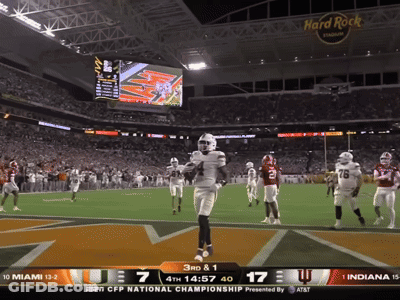 A Football Game Between Miami And Indiana Is Being Played At The Hard Rock Stadium GIF