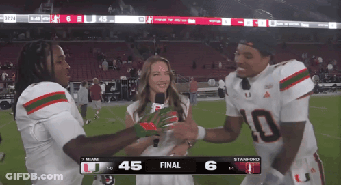 A Football Game Between Miami And Stanford Is Being Played GIF