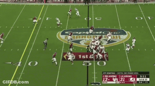 A Football Game Between Oklahoma And Alabama Is Going On GIF