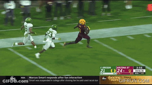 A Football Game Between Oregon And Arizona Is Being Played GIF