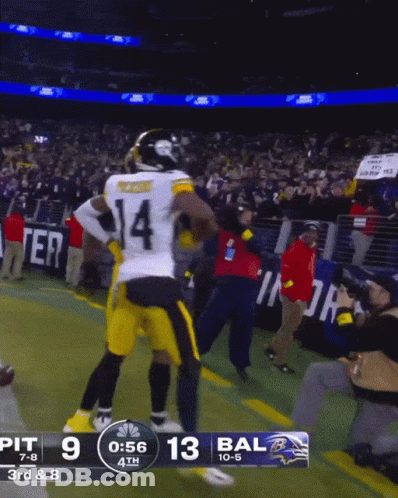 A Football Game Between Pittsburgh And Baltimore Is In Progress GIF
