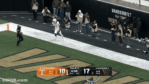 A Football Game Between Tennessee And Vanderbilt With A Score Of 17 To 17 GIF
