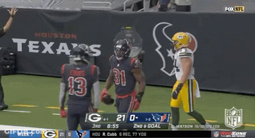 A Football Game Between Texas And Green Bay GIF