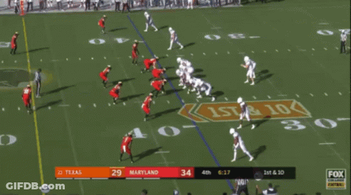 A Football Game Between Texas And Maryland Is Being Broadcast On Fox College Football GIF