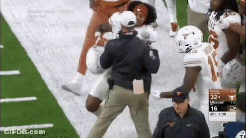 A Football Game Between Texas And Missouri Is Going On GIF