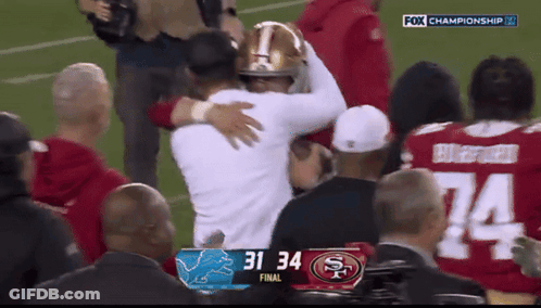 A Football Game Between The 49Ers And The Lions GIF
