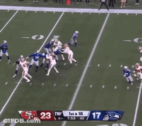A Football Game Between The 49Ers And The Seahawks GIF