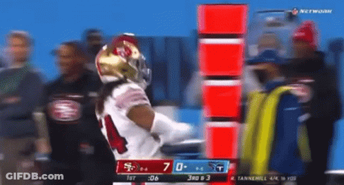 A Football Game Between The 49Ers And Titans Is Being Broadcast On Network GIF
