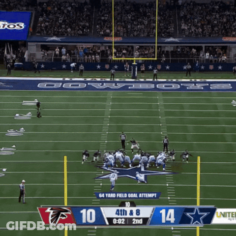 A Football Game Between The Cowboys And Falcons GIF