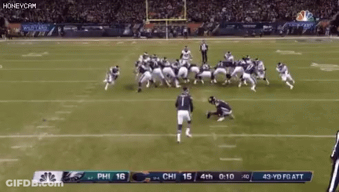 A Football Game Between The Eagles And The Ravens GIF