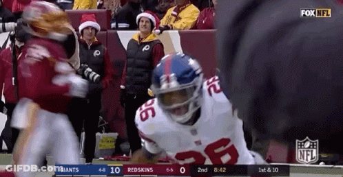 A Football Game Between The Giants And The Redskins Is Underway GIF