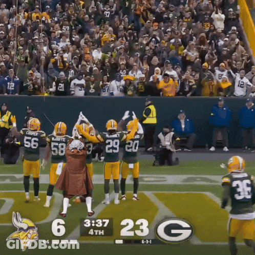 A Football Game Between The Green Bay Packers And The Minnesota Vikings Is Being Played GIF