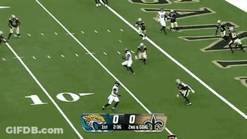 A Football Game Between The Jaguars And The Saints Is Being Played GIF