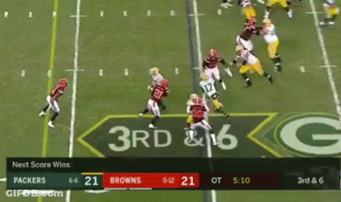 A Football Game Between The Packers And Browns GIF