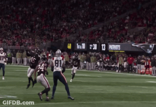 A Football Game Between The Patriots And The Ravens Is Going On GIF