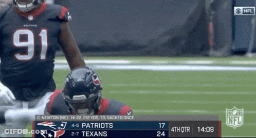 A Football Game Between The Patriots And The Texans Is Being Played GIF