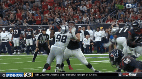 A Football Game Between The Raiders And The Texans Is Being Shown On Cbs GIF