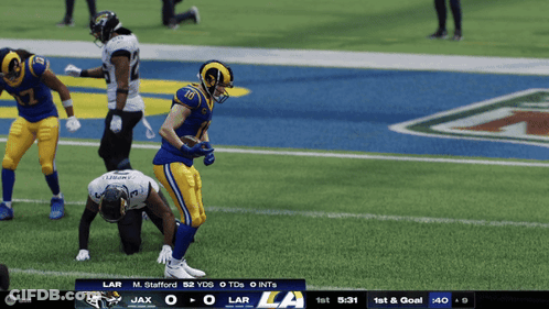 A Football Game Between The Rams And The Jets GIF