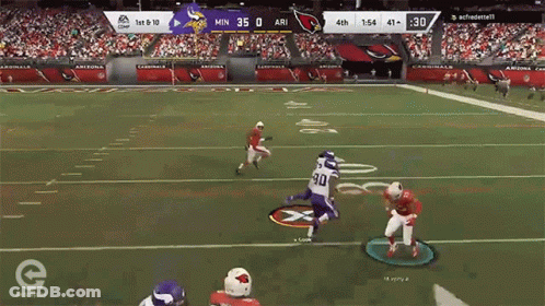 A Football Game Between The Vikings And The Arizona Cardinals GIF
