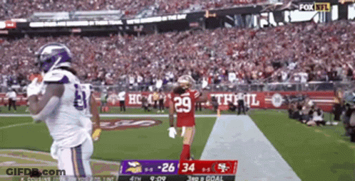 A Football Game Between The Vikings And The San Francisco 49Ers GIF
