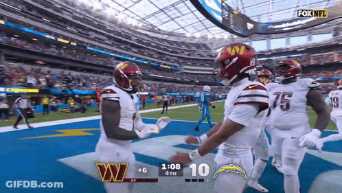A Football Game Between The Washington Redskins And The San Diego Chargers Is Underway GIF