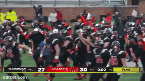 A Football Game Between W Michigan And Ball State GIF