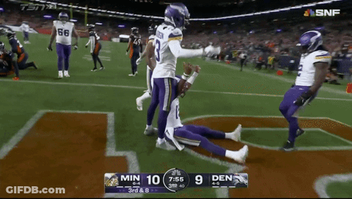 A Football Game Is Being Played Between Minnesota And Den GIF
