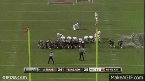 A Football Game Is Being Played Between Texas A & M And Texas A & M GIF