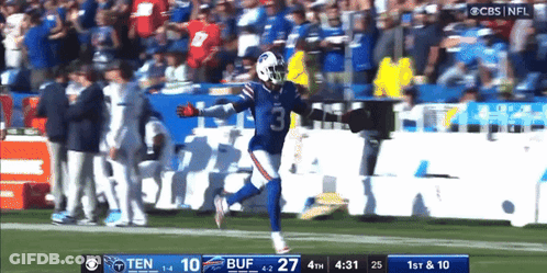 A Football Game Is Being Played Between The Buffalo Bills And The Titans GIF