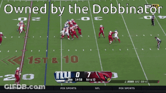A Football Game Is Being Played Between The Giants And The Cardinals GIF