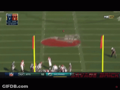 A Football Game Is Being Played Between The Jets And Dolphins GIF