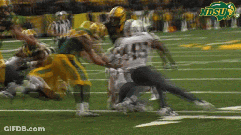 A Football Game Is Being Played Between The Ndsu Team And The Oakland Raiders Team GIF