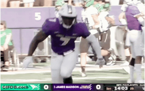 A Football Game Is Being Played Between The North Dakota And The Miami Dolphins GIF