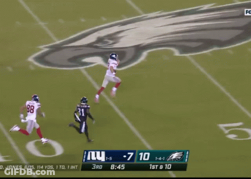A Football Game Is Being Played Between The Ny Giants And The Eagles GIF