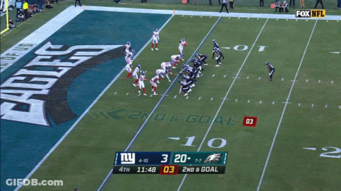 A Football Game Is Being Played Between The Ny Giants And The Philadelphia Eagles GIF
