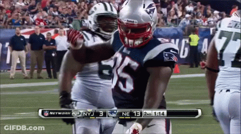 A Football Game Is Being Played Between The Patriots And The New York Jets GIF