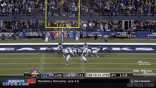 A Football Game Is Being Played Between The Seahawks And The Dals GIF