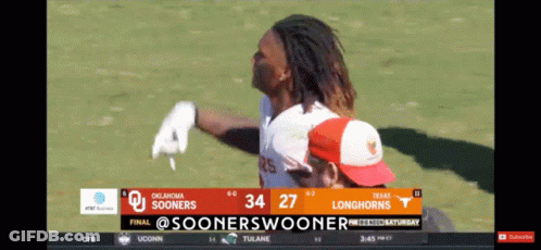 A Football Game Is Being Played Between The Sooners And The Longhorns GIF