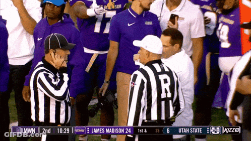 A Football Game Is Being Played Between The Utah State And James Madison GIF