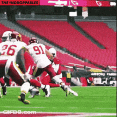 A Football Game Is Being Played In An Empty Stadium GIF