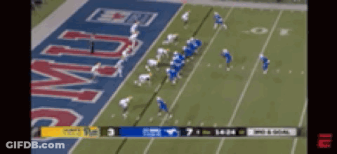 A Football Game Is Being Played In Front Of A Banner That Says ' Army ' GIF