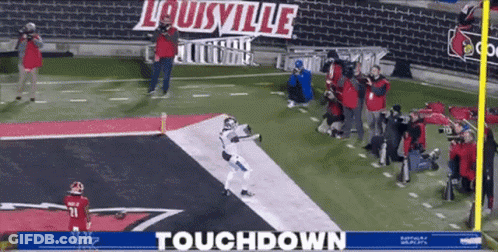 A Football Game Is Being Played In Louisville Ohio GIF
