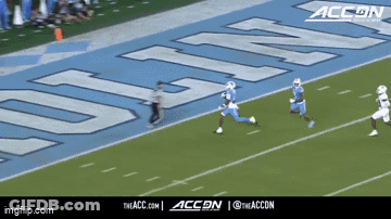 A Football Game Is Being Played On A Field That Has The Word Accn On It GIF