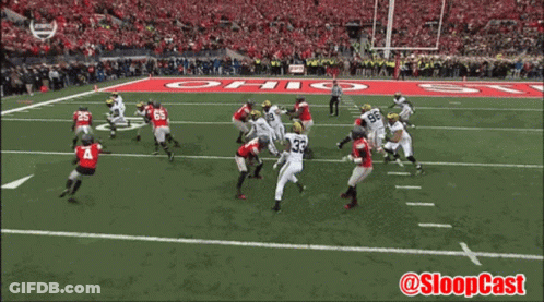 A Football Game Is Being Played On A Field With The Word Ohio On It GIF
