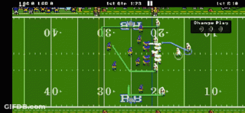 A Football Game Is Being Played On A Screen GIF