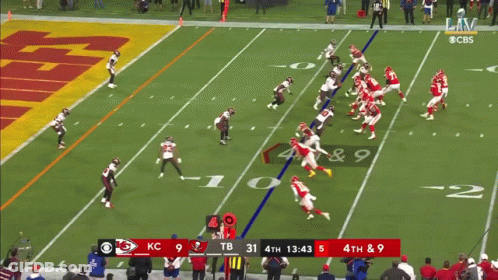 A Football Game Is Being Played On Cbs GIF